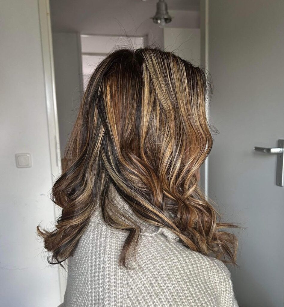 Customer Trixia that we offer a personal experience and professional coloring techniques that make your hair glow.